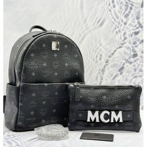 Limited Rare Trilogies MCM Black and Gray Backpack with Clutch Shoulder Bag.